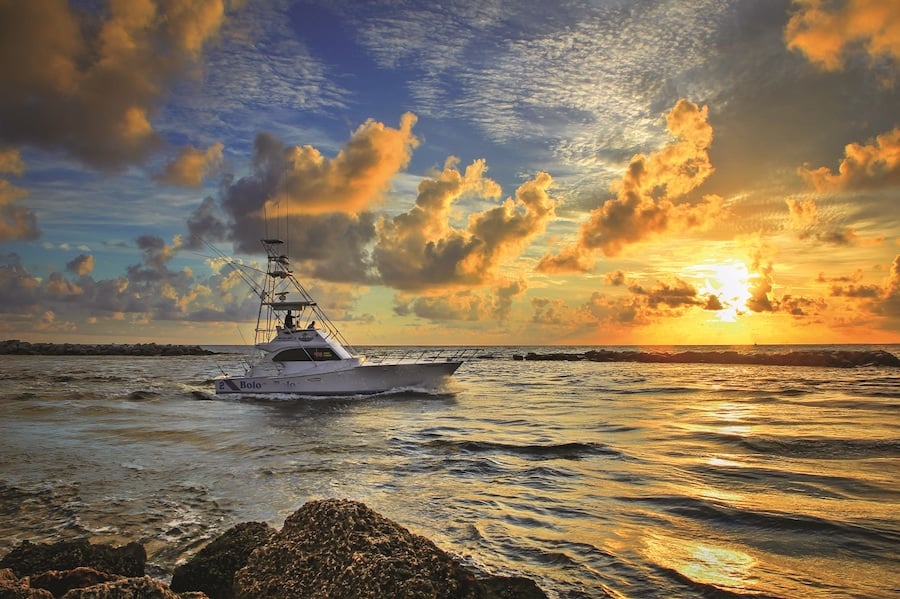 A252-Boat-Going-Fishing-During-Sunrise-at-the-Pompano-Inlet-Florida-Original