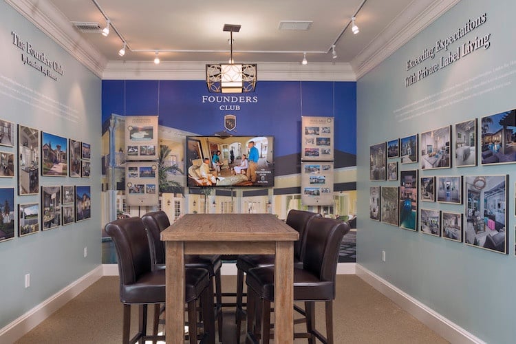 Images of London Bay Homes' luxury homes can be found in the intimate sales room.jpg
